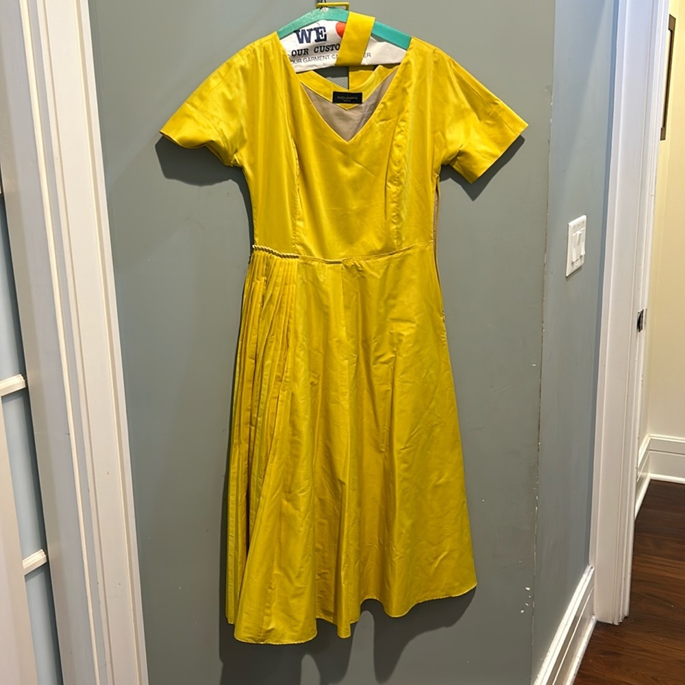Below the knee, yellow dress shorts sleeve, pleaded skirt, belted, side zipper